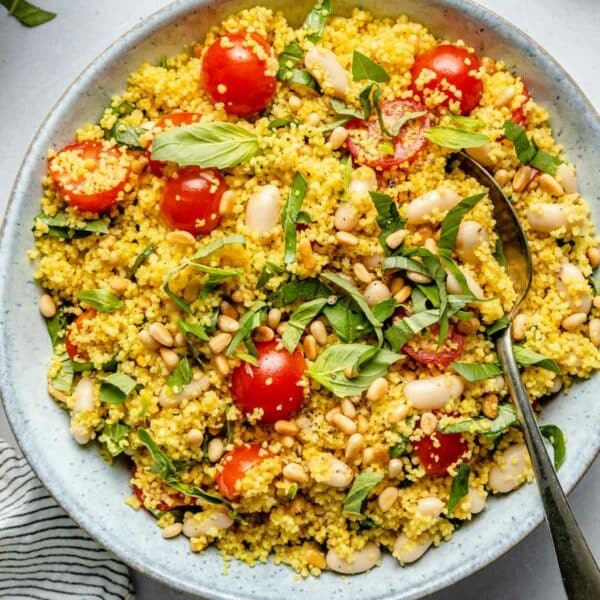 Couscous salad with cherry tomatoes and fresh basil.