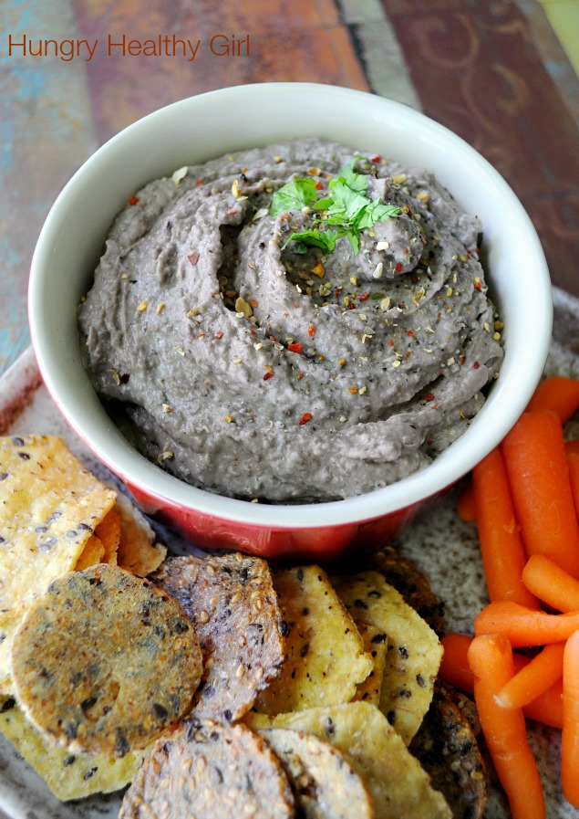 Spicy Black Bean Hummus- a super easy and healthy dip that pairs perfectly with crackers, chips and/or fresh veggies.