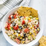 Cottage Cheese Tuna Salad in a white bowl served with tortilla chips