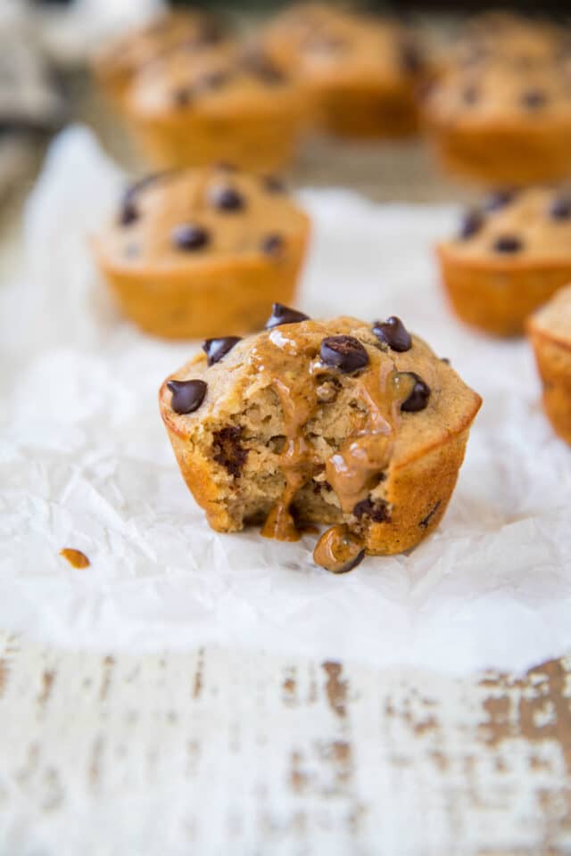 chocolate chip muffin with peanut butter drizzle dripping down