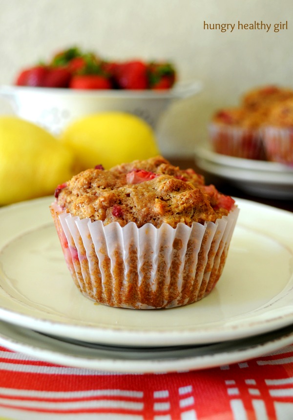 Whole Grain Strawberry Muffins- Scrumptious whole grain muffins, bursting with fresh strawberries, a hint of lemon and tons of flavor are perfect for breakfast or a quick grab-n-go snack!