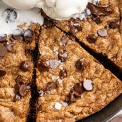 Chocolate chip cookie skillet topped with ice cream.