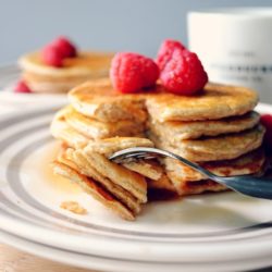 Clean and Simple Oat Pancakes- ight, gluten-free, low-calorie and easy peasy to whip up. Just mix all of the ingredients in your blender and pour onto the griddle- perfect for those super busy mornings!