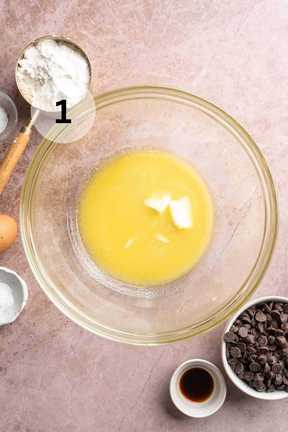 Melted butter in a glass bowl.