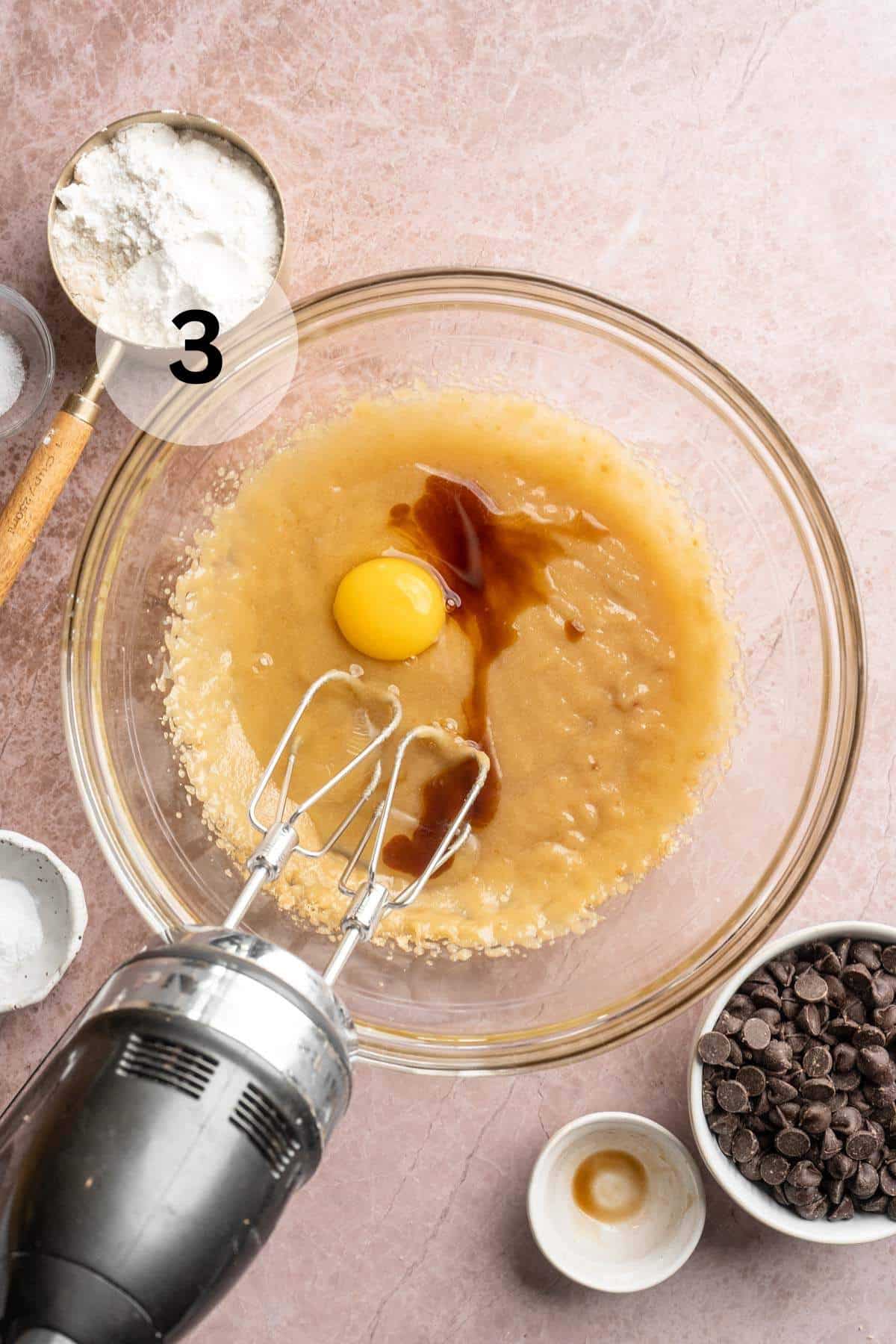 Egg and vanilla added to cookie dough.