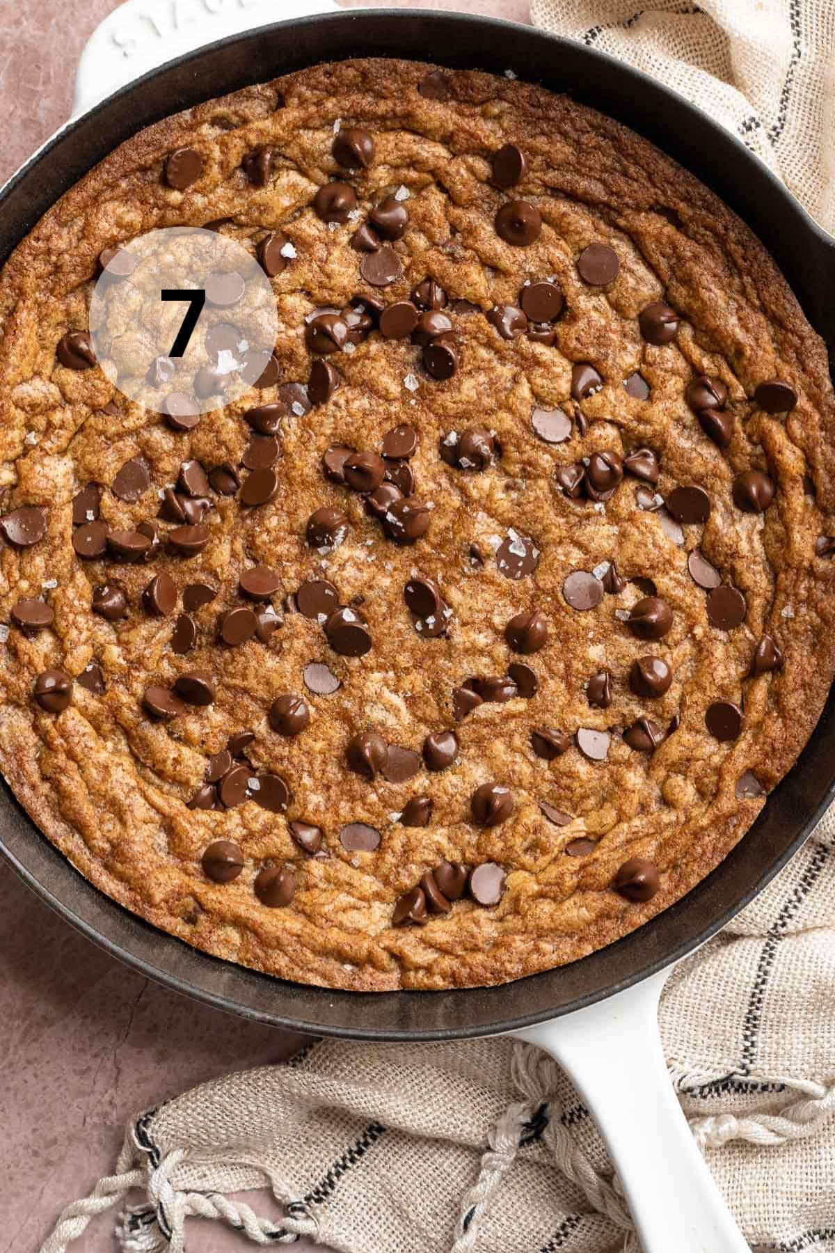 Cookie skillet topped with chocolate chips.