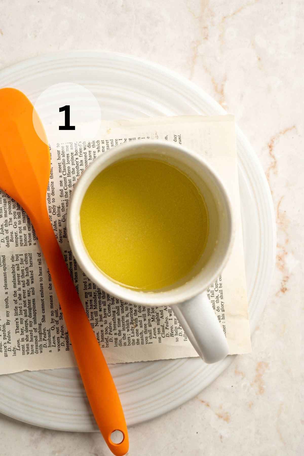 Melted butter in a mug.