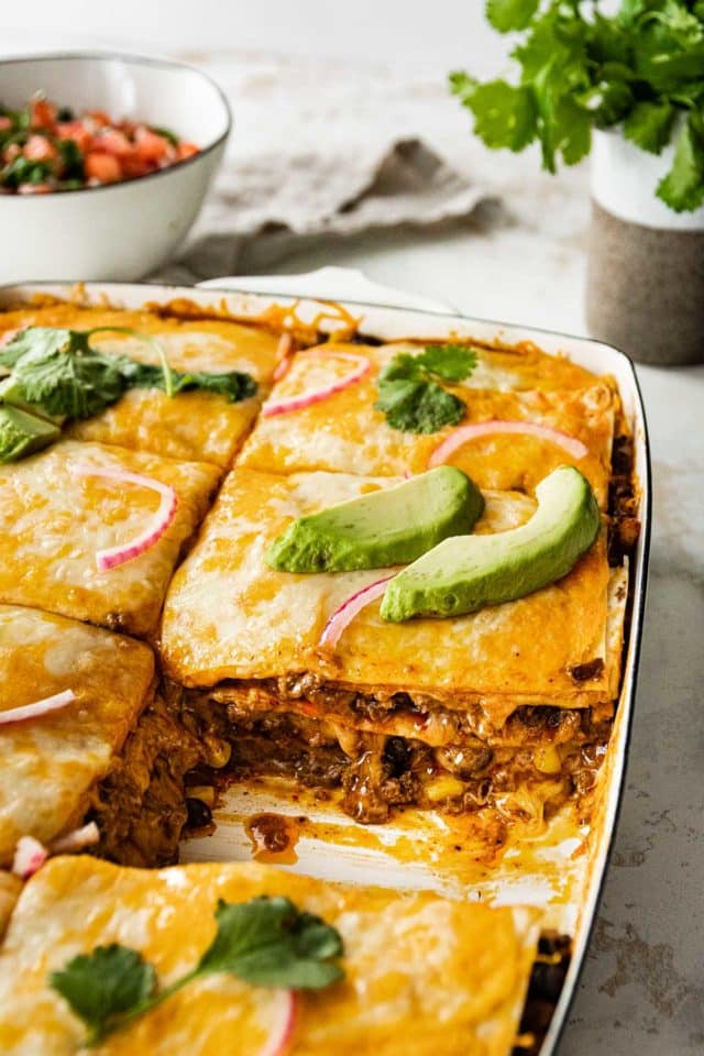 mexican lasagna in a casserole dish