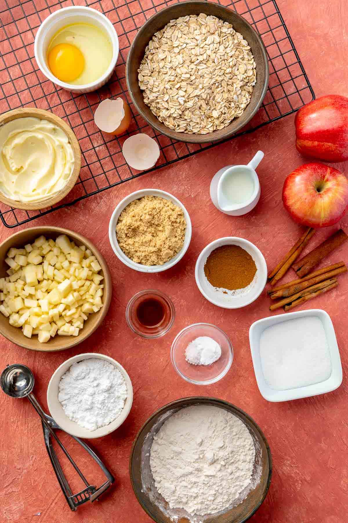 Oats, flour, diced apple, sugar, butter and spices divided into small bowls.