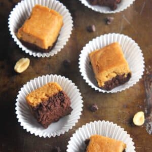 Pieces of healthy buckeye fudge in cupcake liners.