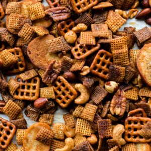Sweet and spicy honey Chex mix on a pan.