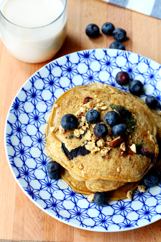 Fluffy gluten-free pancakes with plump juicy blueberries made even more scrumptious with crunchy granola!
