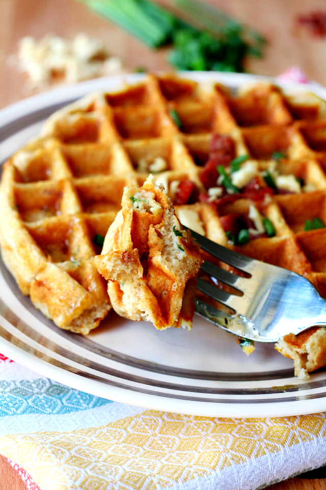 Savory Bacon and Cheese Waffles- sweet waffle batter with savory bacon and cheese is truly a match made in breakfast heaven!