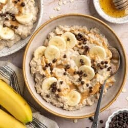 Egg white oatmeal topped with banana slices and mini chocolate chips.