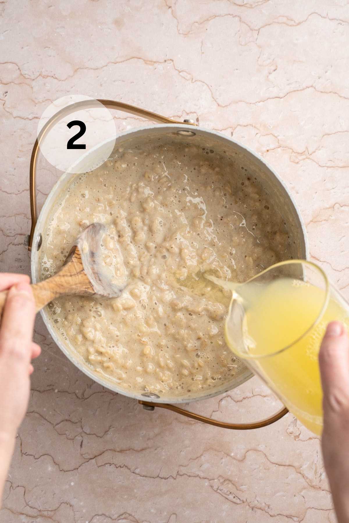 Stirring egg whites into oatmeal.