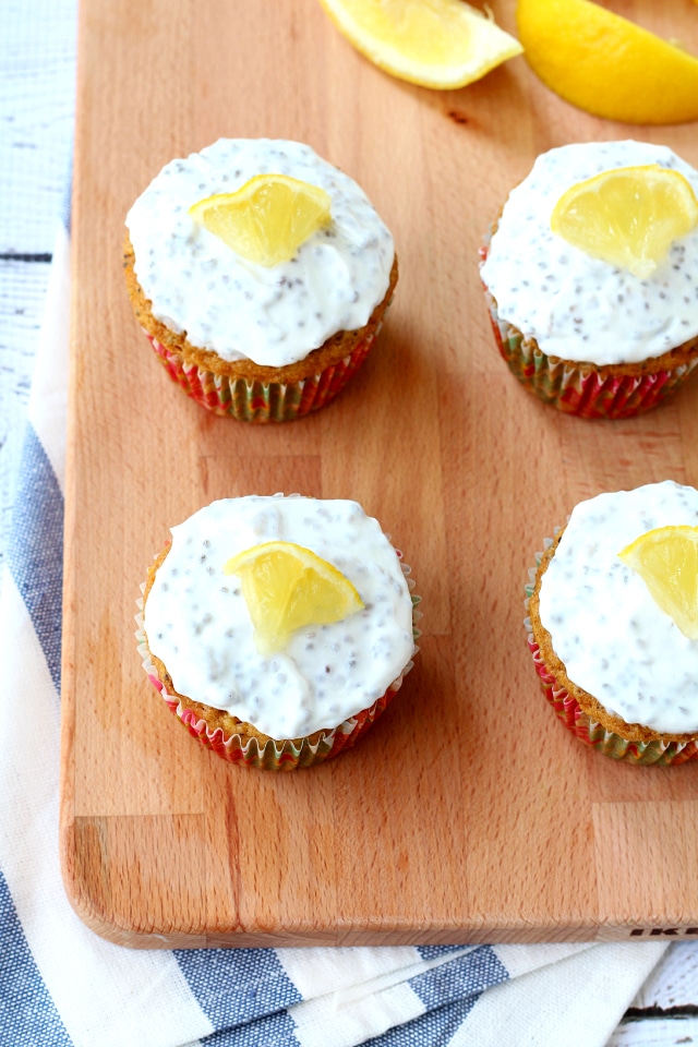 Healthy Lemon Poppy Seed Muffins- delightful lemony flavor topped with Greek yogurt frosting to give these babies the perfect amount of sweetness!