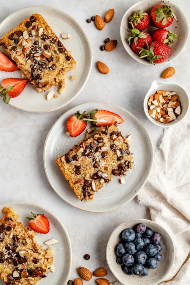 baked oatmeal topped with chocolate chips and almond slices