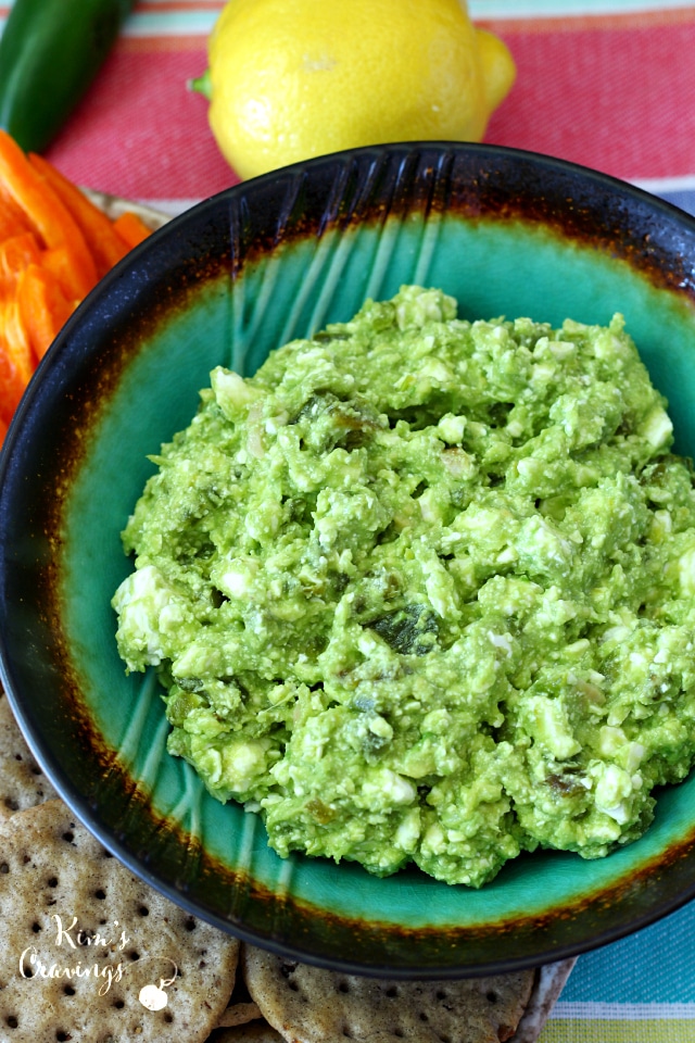 Avocado Feta Dip- Tangy feta cheese, creamy avocado, roasted garlic and jalapeno, lemon and olive oil combine to create a simple crowd-pleasing dip.