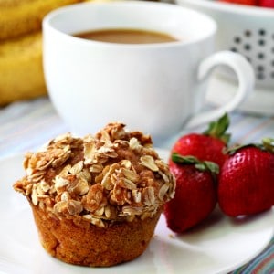 Strawberry Banana Whole Grain Muffins filled with juicy strawberries and covered with a sweet oat streusel topping! These muffins are a MUST make!