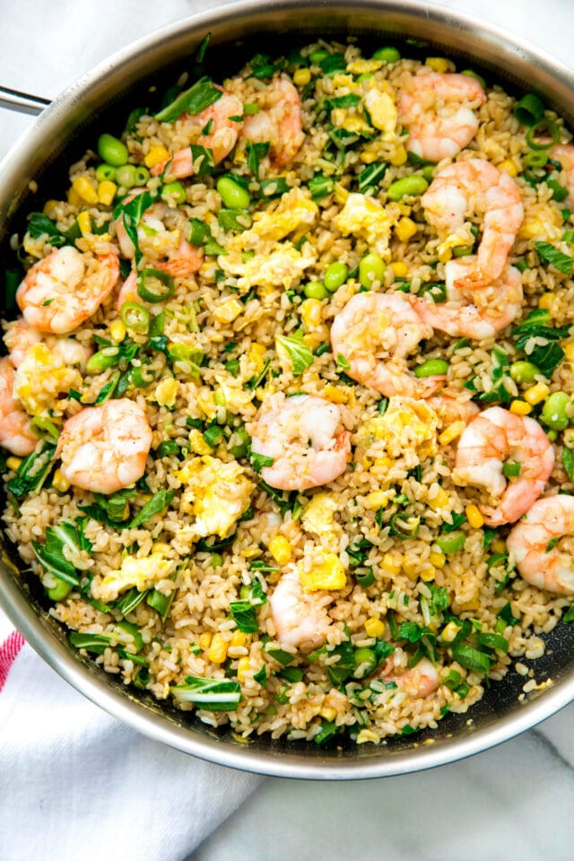 skillet with fried rice and shrimp