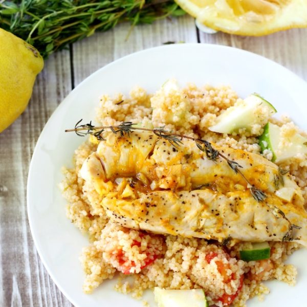 Baked chicken and couscous combine with ultra-healthy and flavorful ingredients; like lemon, thyme and garlic, in a light-yet-filling meal, that's bursting with summer flavors and textures.