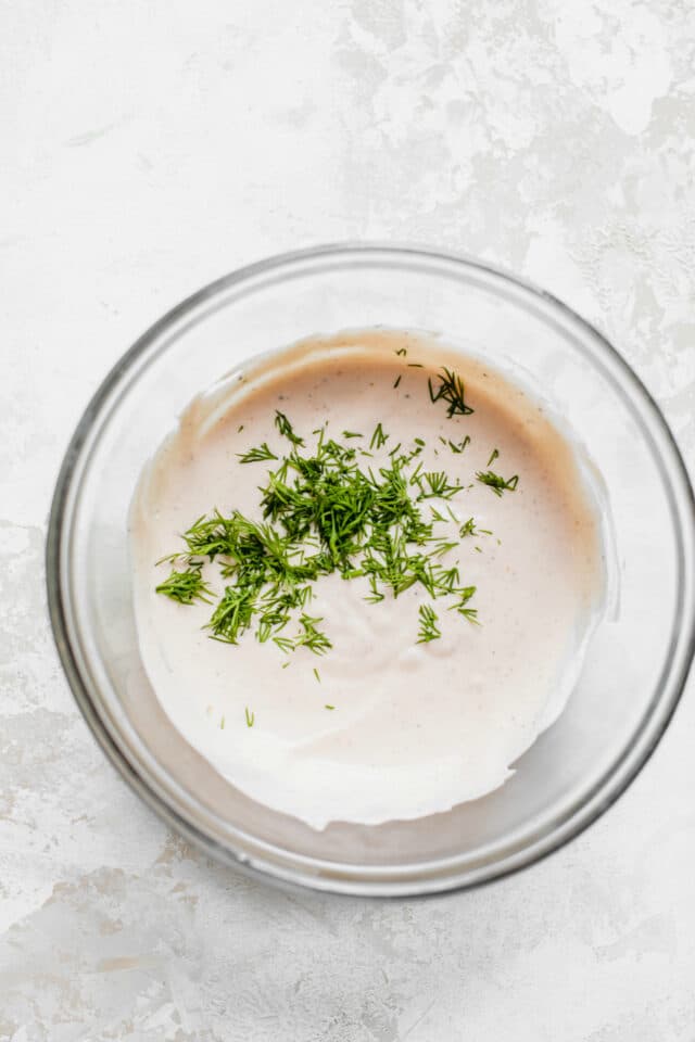 creamy white sauce topped with fresh dill