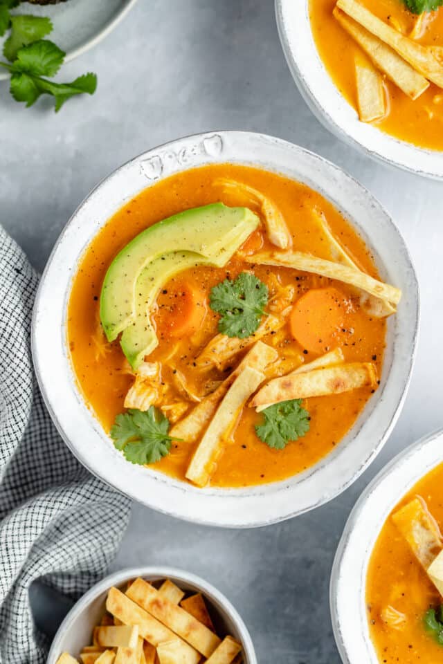 white bowl filled with healthy chicken tortilla soup