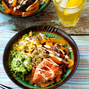 The Sriracha Salmon Quinoa Bowl is a fun twist on the burrito bowl. A flavorful blend of old favorites joined with new deliciousness! (gluten-free)