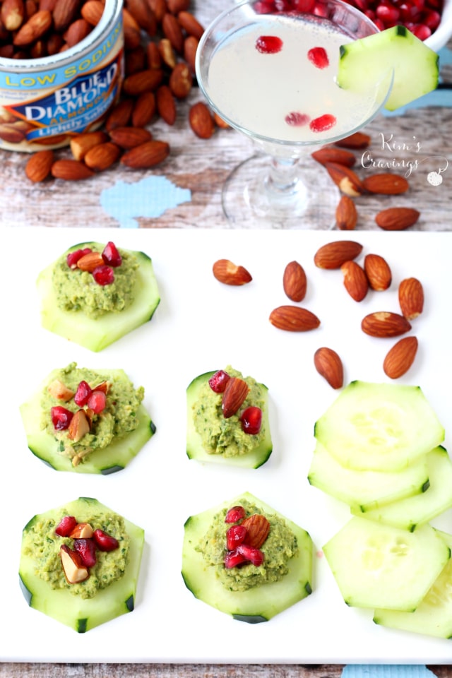 Easy Hummus Cucumber Bites- fresh crisp cucumber topped with flavorful hummus, crunchy almonds and sweet pom seeds makes for an irresistible finger food.