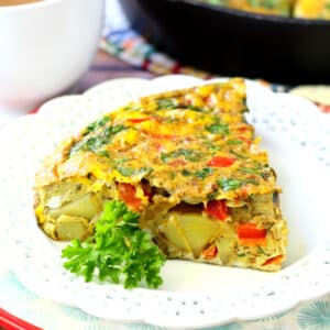 This Festive Holiday Frittata with creamy Yukon Gold Potatoes and zingy sweet red pepper is soon to be the hit of your holiday brunch! (Dairy-Free and Gluten-Free)