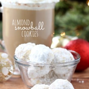 Packed with a lovely almond flavor and dusted with powdered sugar, delicate Almond Snowball Cookies are a family favorite Christmas cookie and perfect for holiday gift-giving.