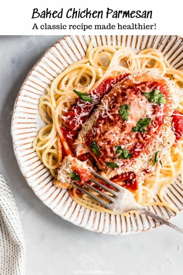 easy baked chicken parmesan on a white plate with a fork
