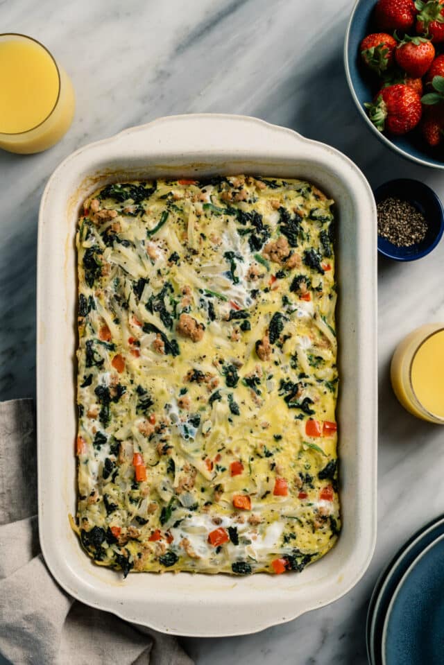 egg casserole in a large white baking dish