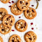 white chocolate cranberry Christmas cookies near Christmas ribbon