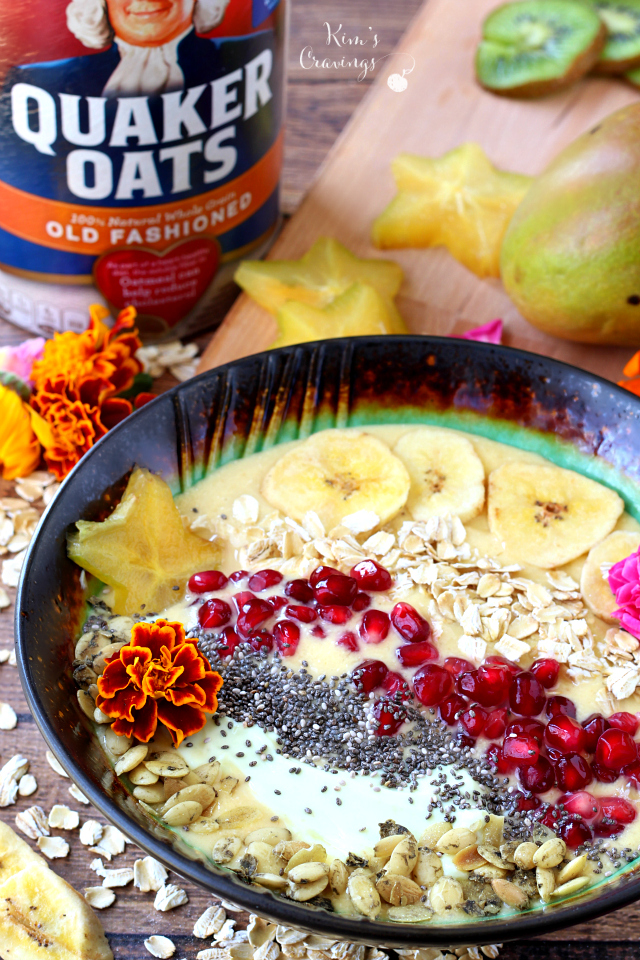 A creamy dreamy Mango Oatmeal Smoothie Bowl- the perfect breakfast when you can't decide between a bowl of oats and a smoothie!