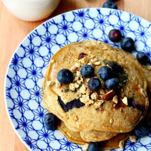 Fluffy gluten-free pancakes with plump juicy blueberries made even more scrumptious with crunchy granola!