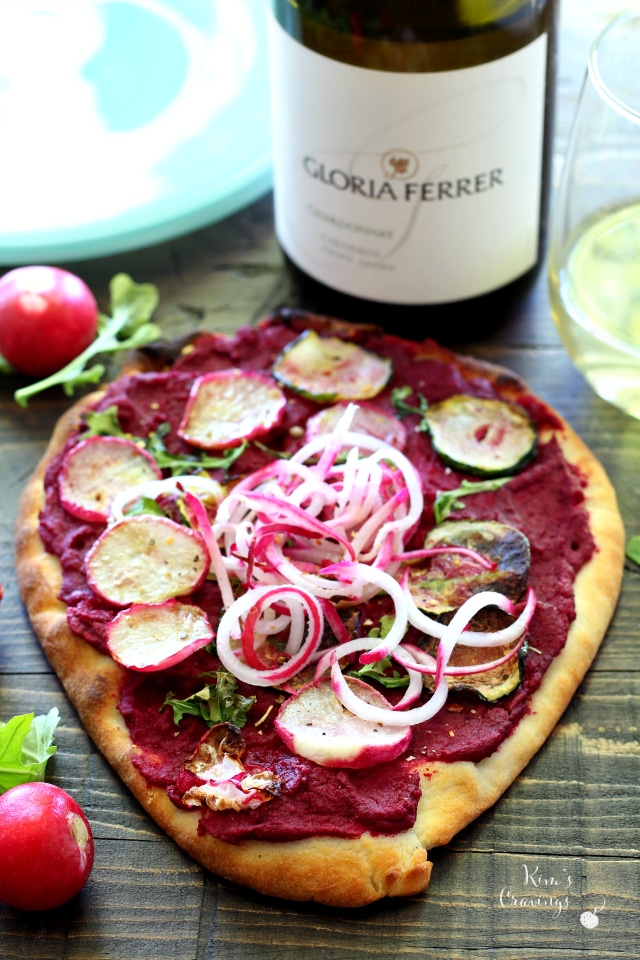 Pizza night is my favorite night, especially with my new Beet Hummus Naan Pizza recipe! Pizza is the best and I absolutely adore hummus, so it's only natural to join the two for a tasty dinner.