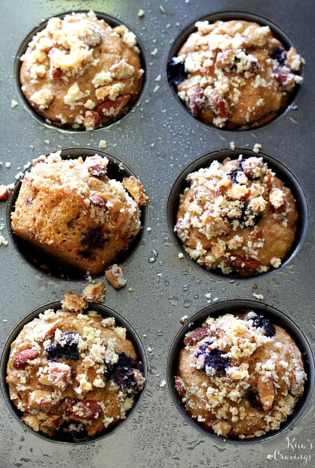 Whole grain blueberry banana muffins filled with plump juicy blueberries and covered with a sweet almond streusel topping! These muffins are a MUST make and so perfect for Easter brunch!
