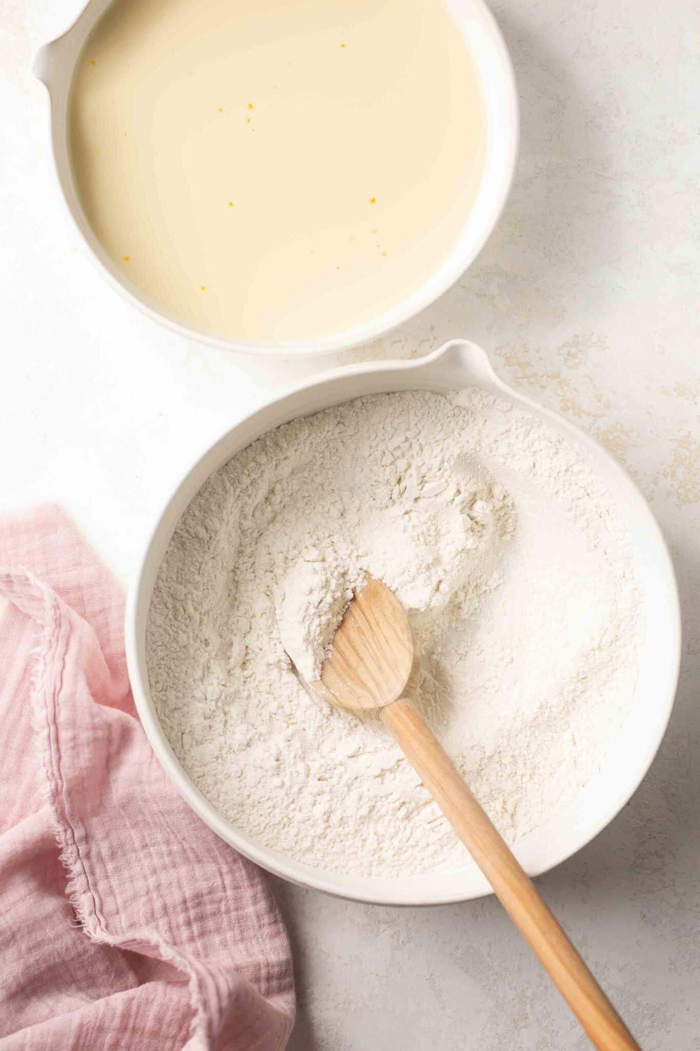 Whisking together flour with baking powder and salt.