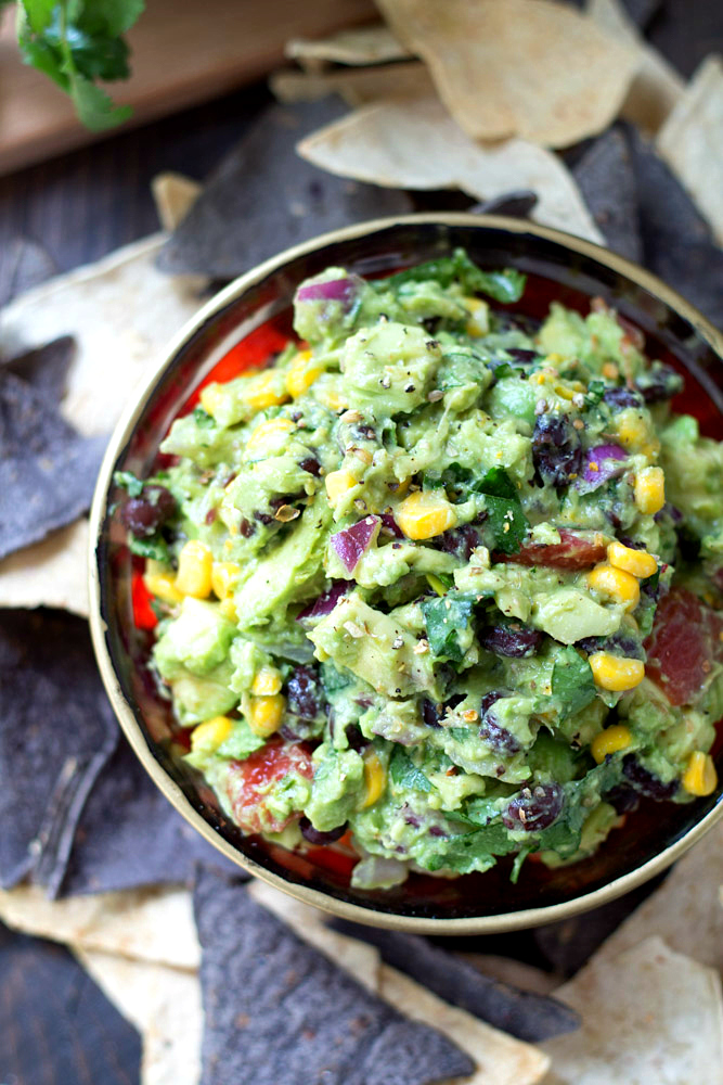 Southwestern Guacamole with bold, fresh flavors just might be my all-time favorite dip recipe. It doesn't get much better than avocado combined with favorite Southwestern ingredients.