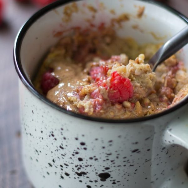 If you're looking for a delicious, easy, mess-free morning meal, you're going to love this recipe for Raspberry Apple Microwave Baked Oatmeal in a Mug.