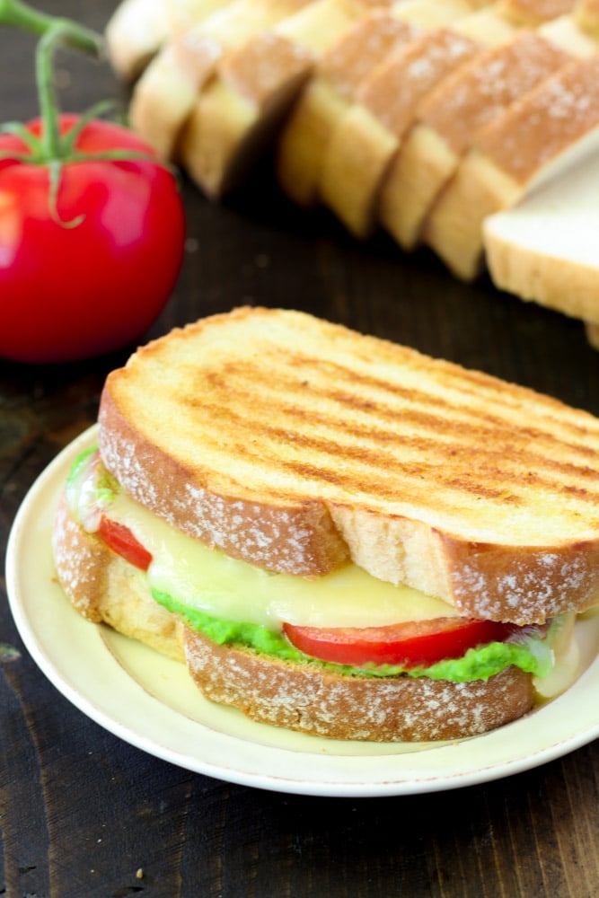 Celebrate National Grilled Cheese Day in the most delicious way possible- with an irresistible Caprese Grilled Cheese with Pesto! 