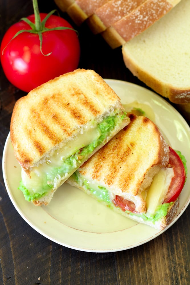 Celebrate National Grilled Cheese Day in the most delicious way possible- with an irresistible Caprese Grilled Cheese with Pesto! 