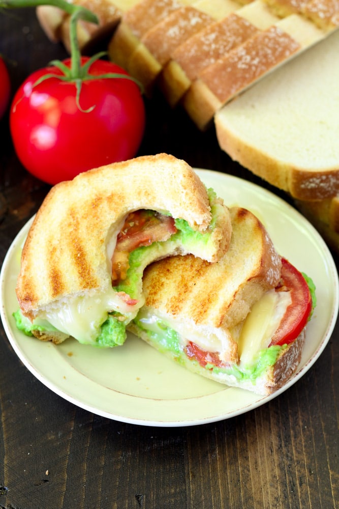 Celebrate National Grilled Cheese Day in the most delicious way possible- with an irresistible Caprese Grilled Cheese with Pesto!
