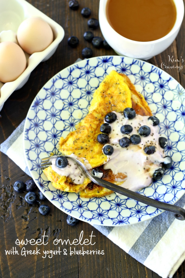 A light, maple flavored sweet omelet topped Greek yogurt and juicy blueberries is the perfect change of pace for breakfast! 