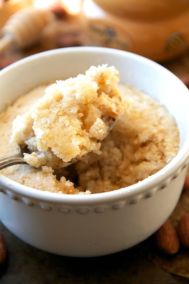 Satisfy your craving for something sweet and doughy with this honey almond oatmeal mug cake! It’s super quick and easy to make, contains NO flour, butter, or oil, and makes a deliciously healthy single-serving snack.