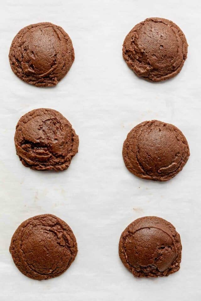 Baked brownie cookies on a pan.