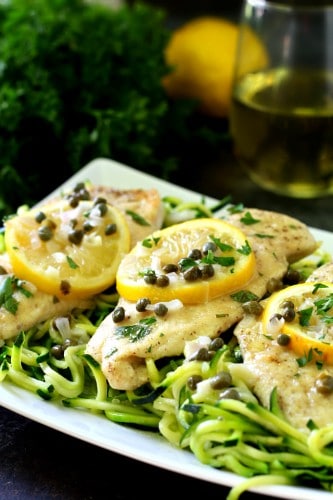 A lighter twist on the classic lemony chicken, this healthy chicken piccata recipe is full of zesty flavor and served over zucchini noodles.