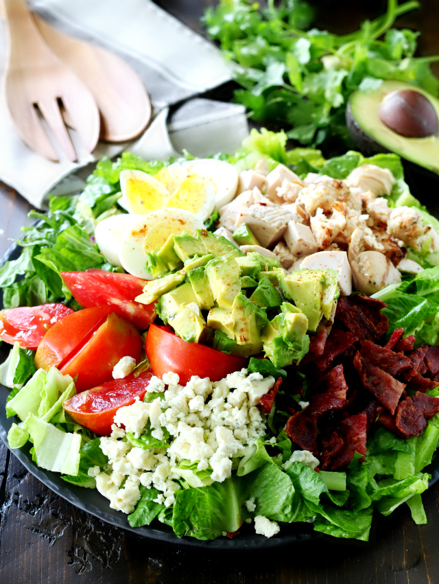 This Healthy Chicken Cobb Salad has all of the goodness you remember from the classic cobb salad, but the flavor is kicked up in a major way!