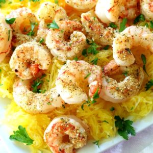 Fire up that grill! These crowd-pleasing grilled shrimp over spaghetti squash are light, easy and so delicious!